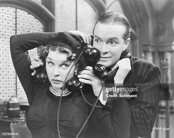 Comedians Bob Hope and Martha Raye share telephones and get wires crossed in the 1938 film, College Swing.