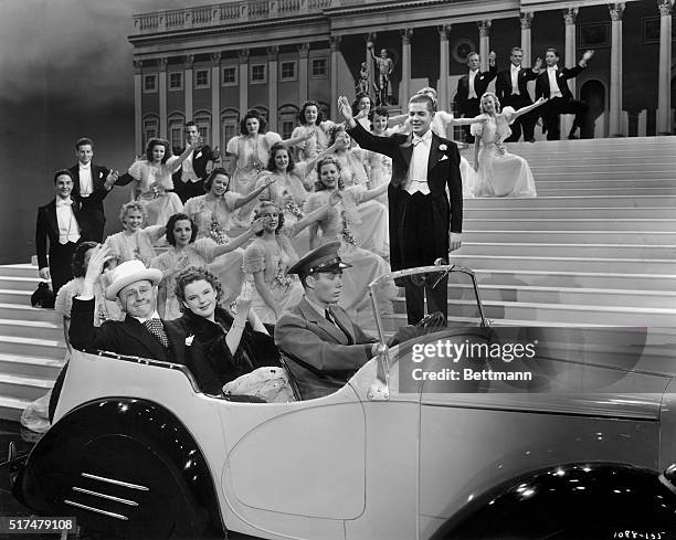 "President" Rooney and his First Lady, Judy Garland... They arrive at the capital in style for the God's Country number of their new co-starring...