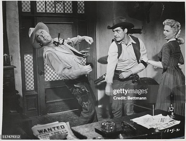 Film still from Universal Pictures Co. 1956 western, Red Sundown. Rory Calhoun Dean Jagger, and Martha Hyer. Directed by Jack Arnold.