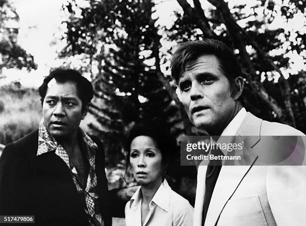 Left to right, Manu Tupou as Japanese officer Kimo Nahashi, France Nuyen as undercover agent Iso Taguchi, and Jack Lord as Steve McGarrett, head of...