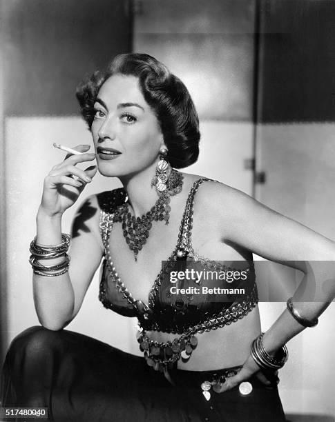 Joan Crawford, actress known for her portrayals of strong independent women, won an Academy Award for her performance in Mildred Pierce.