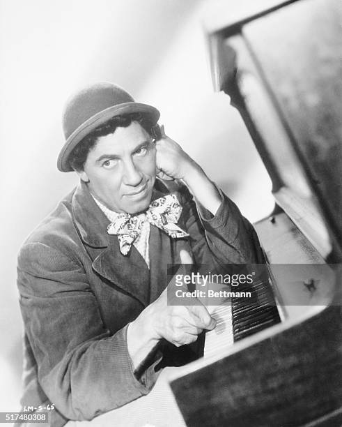 Chico Marx, who costars with brothers Groucho and Harpo in Producer David L. Loew's comedy A Night in Casablanca , is a whiz at the piano. He is...