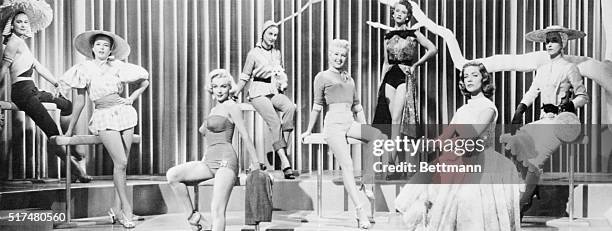 Scene from How to Marry a Millionaire, with stars Marilyn Monroe as Pola Debevoise, Betty Grable as Loco Dempsey, and Lauren Bacall as Schatze Page...