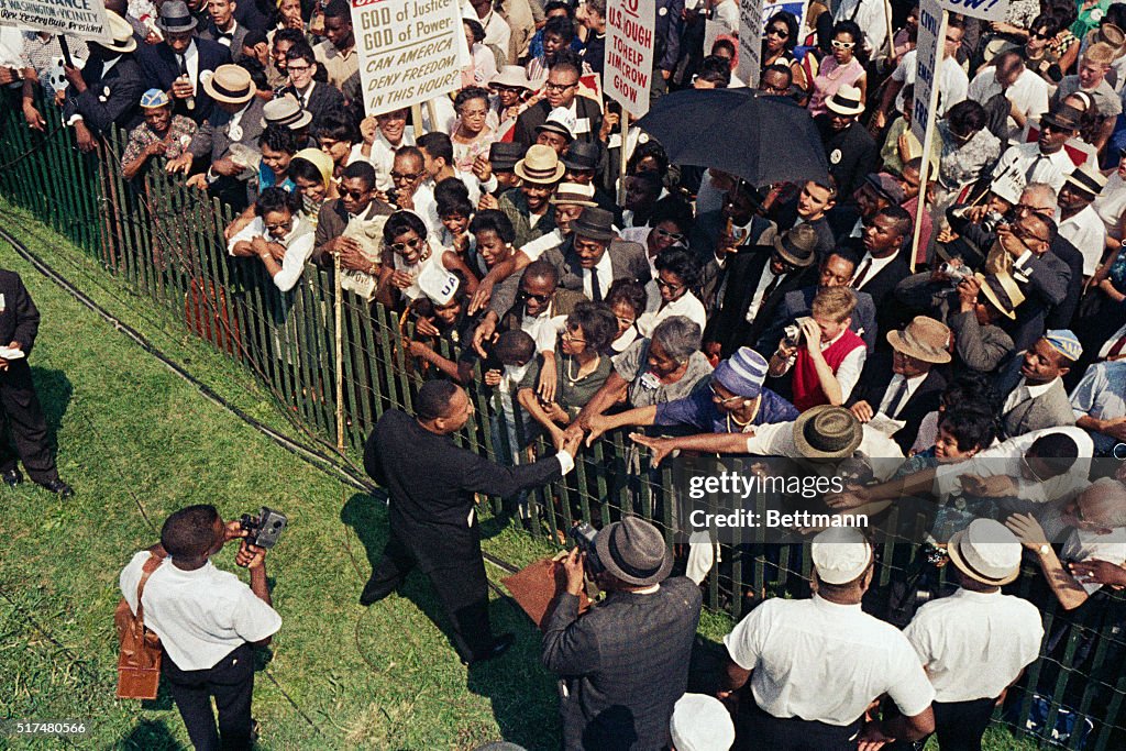 Martin Luther King Shaking Hands with Crowd