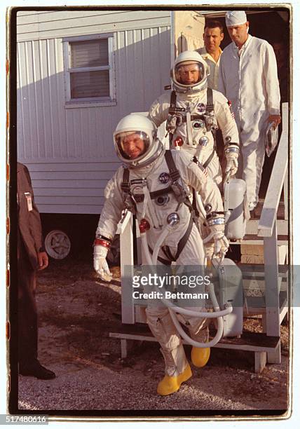Cape Kennedy, Fla.: Astronauts Gordon Cooper and Pete Conrad leave dressing quarters for van which took them to pad 19 and their Titan II rocket for...