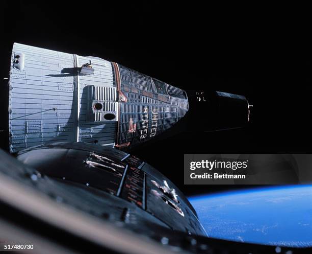Space center, Houston. Camera aboard Gemini 6 catches lettering on Gemini 7 as they meet in space, December 15th. Gemini 7 astronauts Borman and...