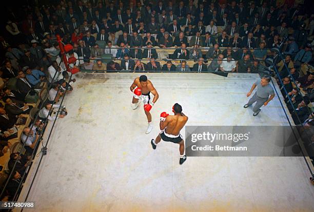 Heavyweight championship fight between Cassius Clay and Floyd Patterson. Clay, the champion, retained his title.