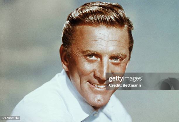 Actor Kirk Douglas, alone in headshoulders photograph.