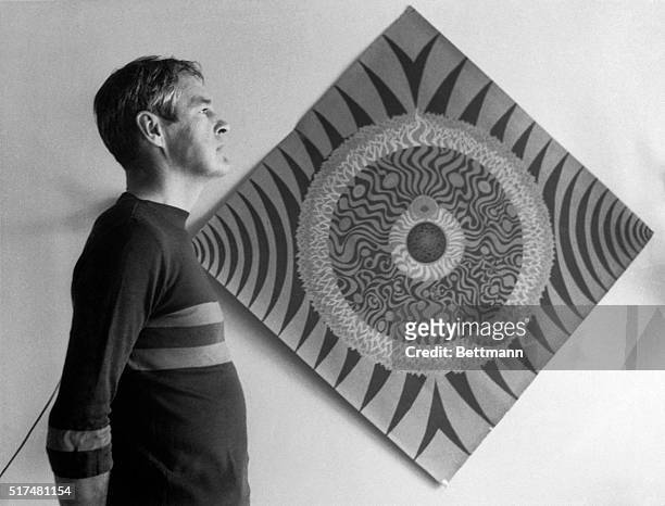 American psychologist Dr Timothy Leary standing next to a mandala in 1966. By contemplation of mandalas Leary said he was able to reach a higher...