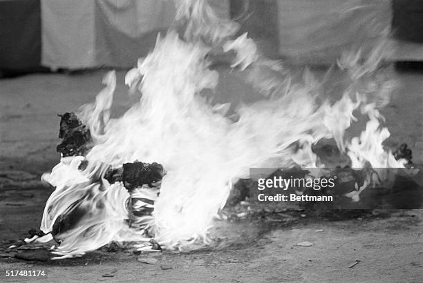 Buddhist nun performs a ritual suicide, by self immolation, outside the Dien De Pagoda in Vietnam.
