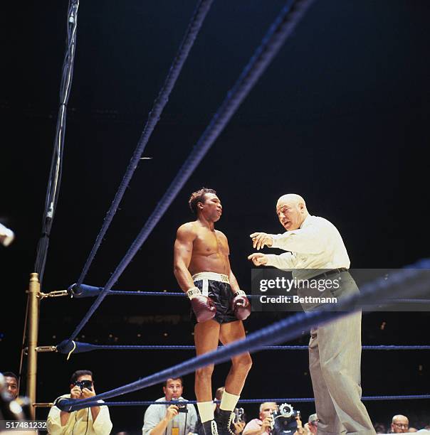 Muhammad Ali in fight with challenger Cleveland Williams in which Ali retained his heavyweight title.