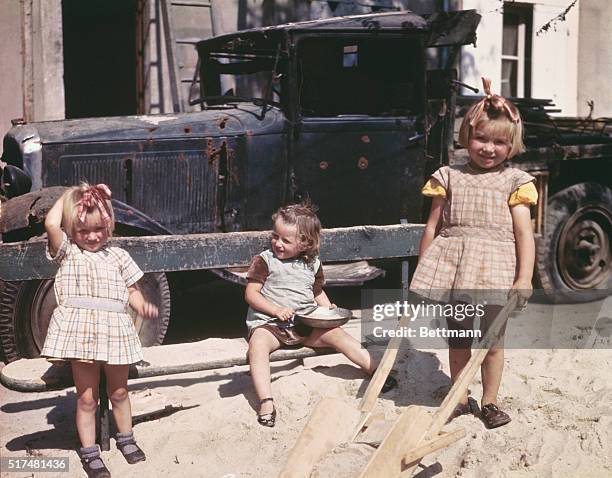 Children at play is a good sign that normalcy is fast returning to the ghost city of Cherbourg, France. Shortly after the liberation of the port...