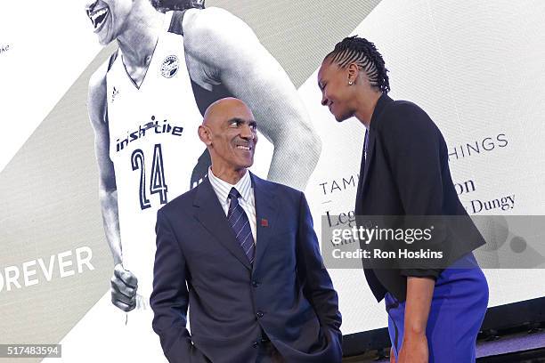 Former NFL Coach, Tony Dungy talks to Tamika Catchings of the Indiana Fever during her Legacy Luncheon at Bankers Life Fieldhouse on March 22, 2016...