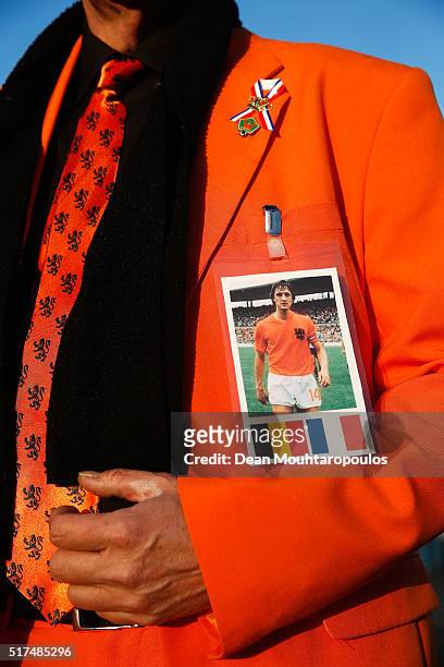 Dutch fan displays a picture of Johan Cruyff of Netherlands prior to the International Friendly match between Netherlands and France at Amsterdam...