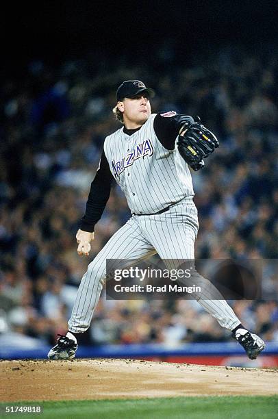 Curt Schilling of the Arizona Diamondbacks delivers a pitch in Game Four of the 2001 World Series against the New York Yankees at Yankee Stadium on...