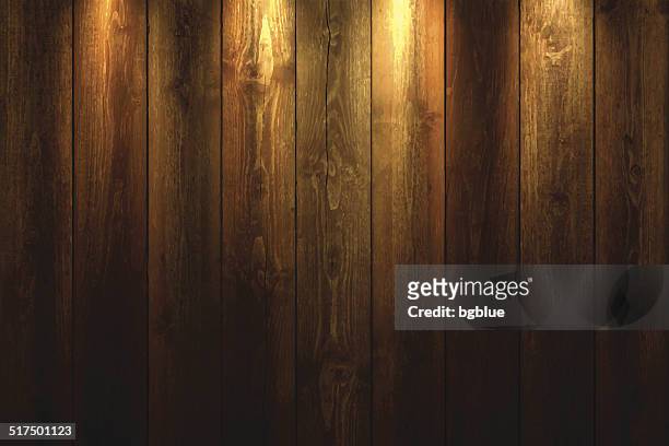 light on wooden background - wood background stock illustrations