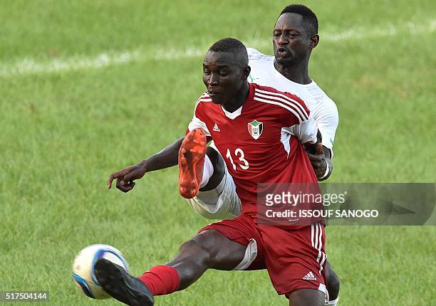 Ivory Coast's Ousmane Diarrassouba Viera vies with Sudan's Nazar Hamed during the 2017 Africa Cup Nations football match between Ivory Coast and...