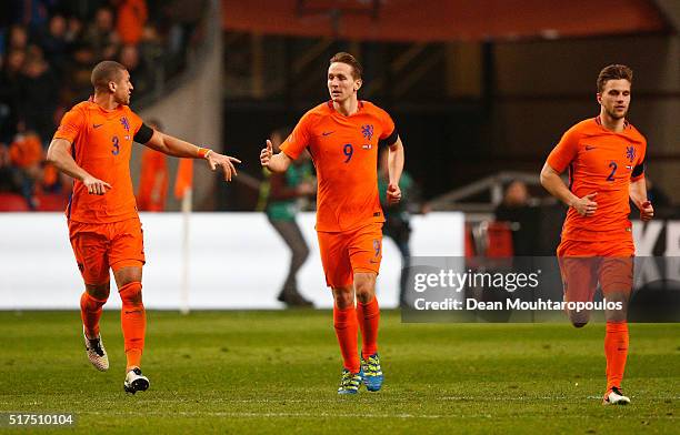 Luuk de Jong of the Netherlands celebrates scoring his team's opening goal during the International Friendly match between Netherlands and France at...