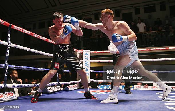 Tom Baker lands a right on Jack Morris during the English Light-Heavyweight Championship fight between Tom Baker and Jack Morris at York Hall on...