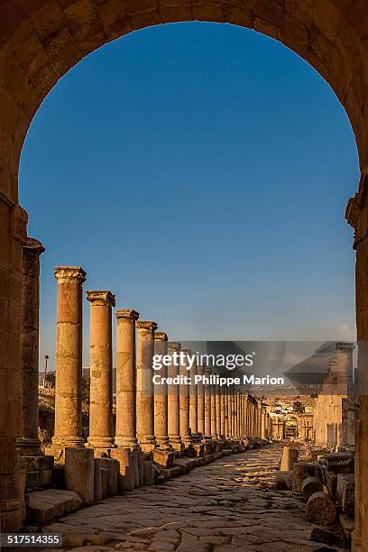 roman ruins of gerasa in jerash, jordan - natural arch stock pictures, royalty-free photos & images