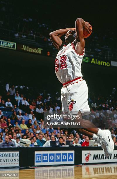 Harold Miner of the Miami Heat dunks against the Atlanta Hawks during the NBA game on November 19, 1993 in Miami, Florida. NOTE TO USER: User...