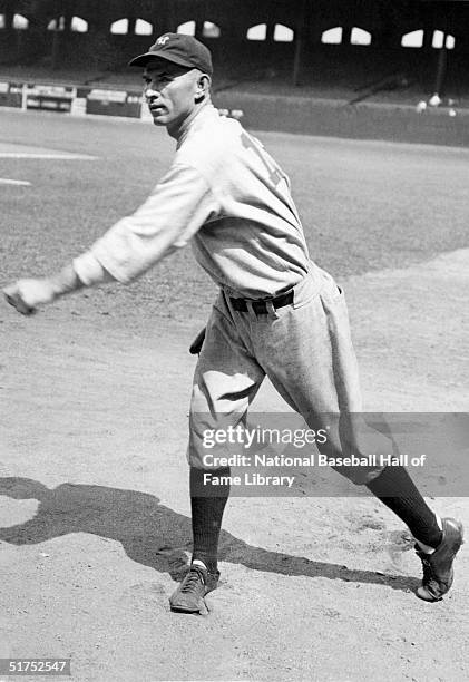 Tom Zachary of the New York Yankees throws before a 1928-1930 season game. Tom Zachary played for the Philadelphia Athletics in 1918, Washington...