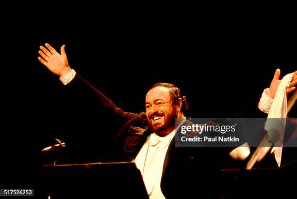 Italian tenor Luciano Pavarotti performs onstage at the Poplar Creek Music Theater, Hoffman Estates, Illinois, August 13, 1984.