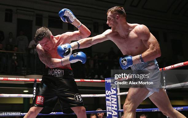 Tom Baker lands a right on Jack Morris during the English Light-Heavyweight Championship fight between Tom Baker and Jack Morris at York Hall on...