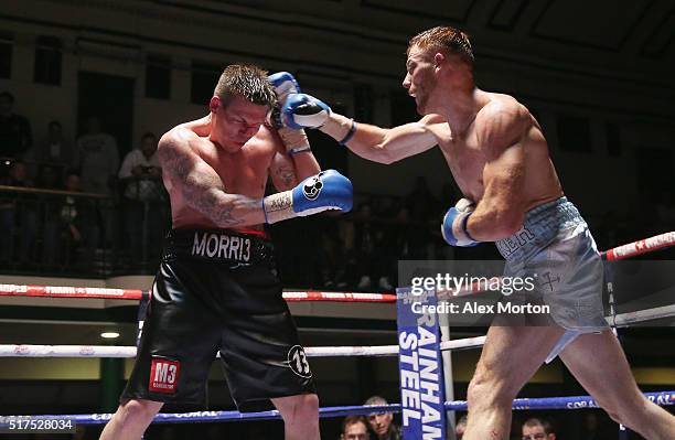 Tom Baker lands a right on Jack Morris during the English Light-Heavyweight Championship fight between Tom Baker and Jack Morris at York Hall on...