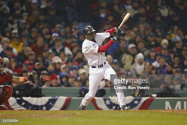 Pokey Reese of the Boston Red Sox bats during game two of the 2004 World Series against the St. Louis Cardinals at Fenway Park on October 24, 2004 in...