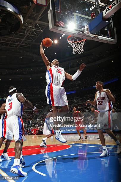 Rasheed Wallace of the Detroit Pistons grabs a rebound against the Houston Rockets on November 2, 2004 at the Palace at Auburn Hills in Detroit,...