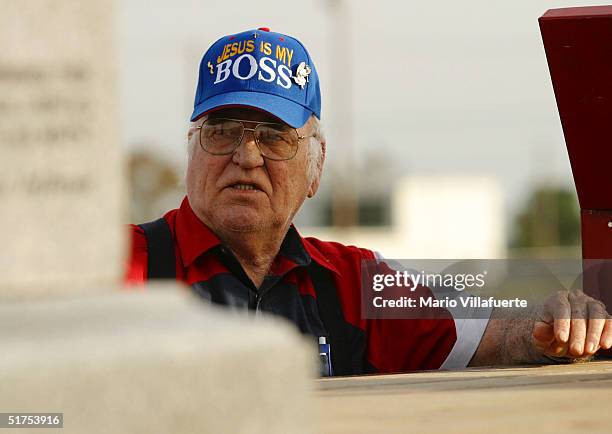 Charlie Breazeace of Longview, Texas, looks at the granite Ten Commandments monument that was removed in 2003 from the Alabama Judicial Building...