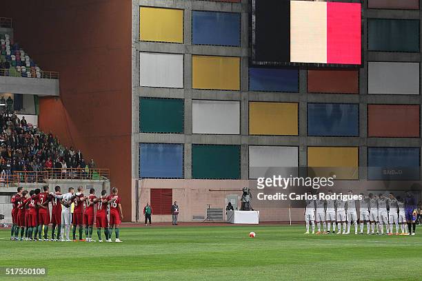 Teams pay respect to Belgium vitims during the match between Portugal and Bulgaria Friendly International at Estadio Municipal de Leiria on March 25,...