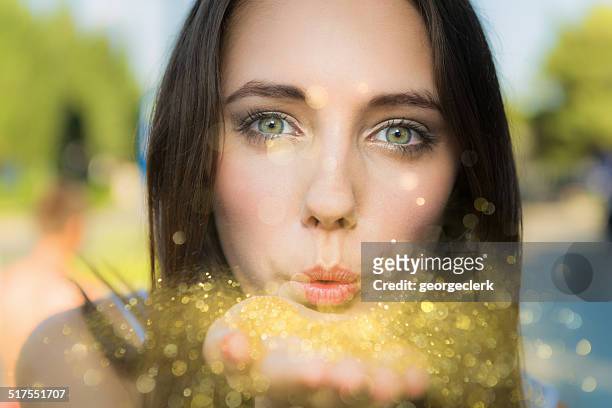 blowing gold dust - brown hair blowing stock pictures, royalty-free photos & images