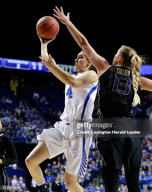 Kentucky's Maci Morris looks for a shooting lane against Washington's Katie Collier in the third round of the NCAA Tournament on Friday, March 25 at...