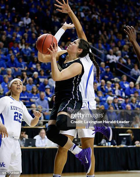 Washington's Kelsey Plum puts in two of her 23 points against Kentucky in the third round of the NCAA Tournament on Friday, March 25 at Rupp Arena in...