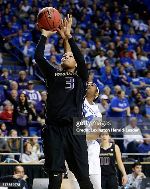 Washington's Talia Walton puts in two of her team-high 30 points against Kentucky in the third round of the NCAA Tournament on Friday, March 25 at...