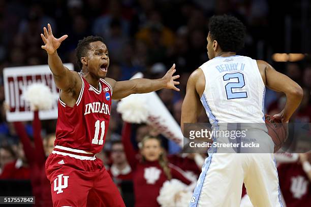 Yogi Ferrell of the Indiana Hoosiers defends Joel Berry II of the North Carolina Tar Heels in the first half during the 2016 NCAA Men's Basketball...