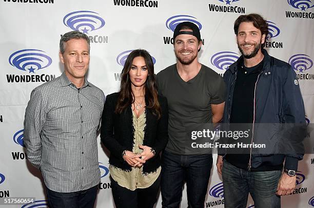 Producer Brad Fuller, actors Megan Fox, Stephen Amell and producer Andrew Form attend a panel at WonderCon 2016 to promote the upcoming release of...