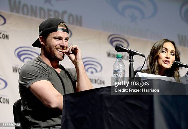 Actor Stephen Amell and Megan Fox attend a panel at WonderCon 2016 to promote the upcoming release of Paramount Pictures' Teenage Mutant Ninja...