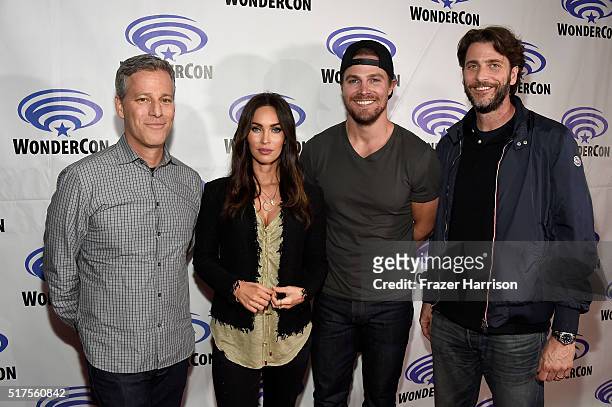 Producer Brad Fuller, actors Megan Fox, Stephen Amell and producer Andrew Form attend a panel at WonderCon 2016 to promote the upcoming release of...
