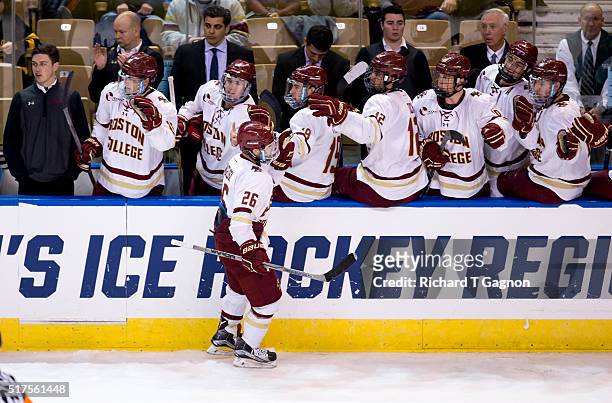 Austin Cangelosi of the Boston College Eagles celebrates his goal against the Harvard Crimson with his teammates during game two of the NCAA Division...