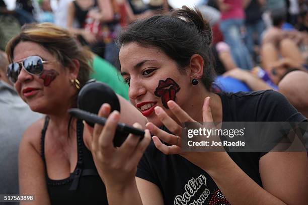 Rolling Stones fans wait for the start of a free concert March 26, 2016 in Havana, Cuba. Thousands of fans waited for the Rolling Stones to play for...