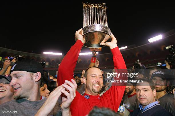 Tim Wakefield of the Boston Red Sox celebrates after winning game four of the 2004 World Series against the St. Louis Cardinals at Busch Stadium on...