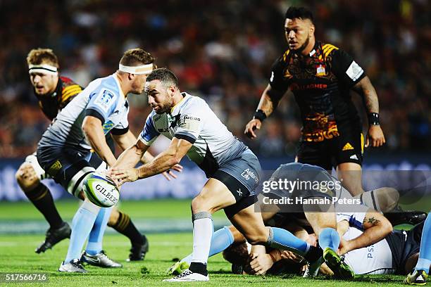 Alby Mathewson of the Force passes the ball out during the round five Super Rugby match between the Chiefs and the Western Force at FMG Stadium on...