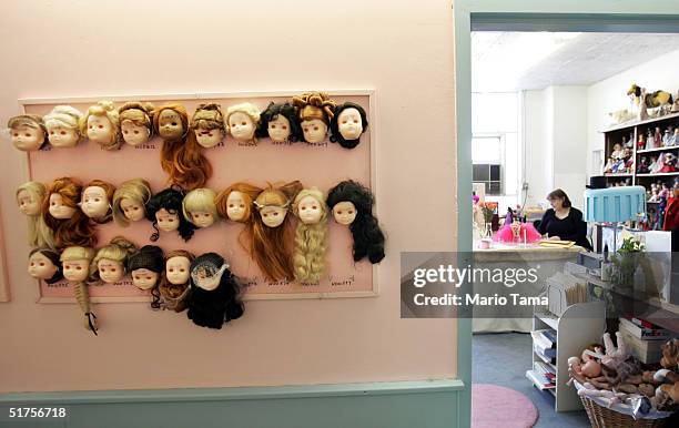 Handmade doll heads are seen next to an office inside The Alexander Doll Company November 17, 2004 in New York City. The company was founded in 1923...