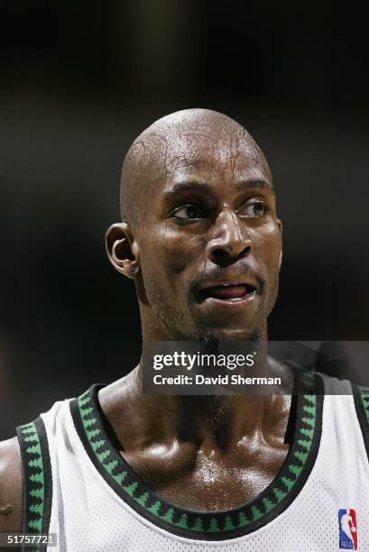 Kevin Garnett of the Minnesota Timberwolves stands on the court during the game against the New Orleans Hornets on November 6, 2004 at the Target...