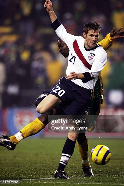 Brian McBride of the United States fights for the ball against Jamaica during the World Cup qualifier match at Crew Stadium on November 17, 2004 in...