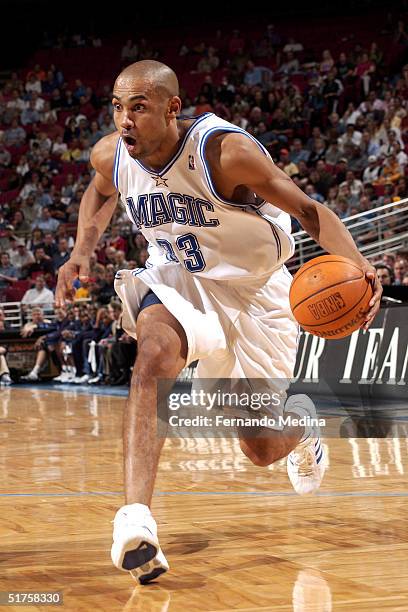 Grant Hill of the Orlando Magic drives to the hoop against the Utah Jazz during a game on November 17, 2004 at TD Waterhouse Centre in Orlando,...