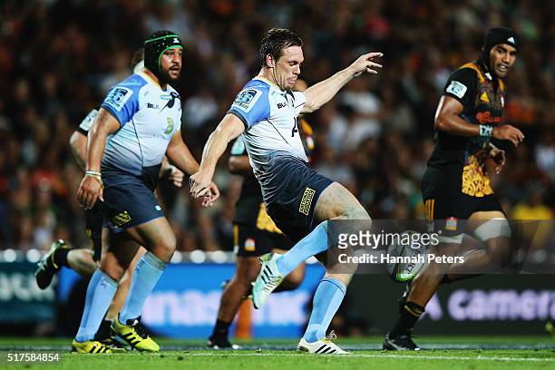 Peter Grant of the Force kicks the ball through during the round five Super Rugby match between the Chiefs and the Western Force at FMG Stadium on...